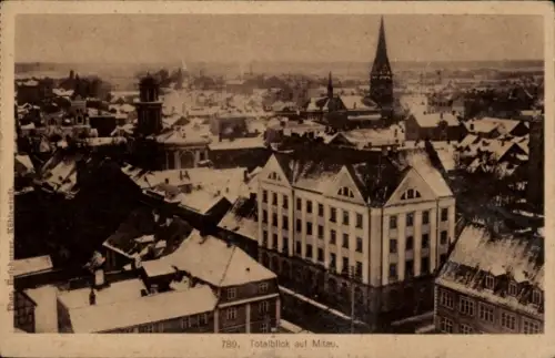 Ak Jelgava Mitau Lettland, Totalblick auf  schneebedeckte Dächer,  Gebäude