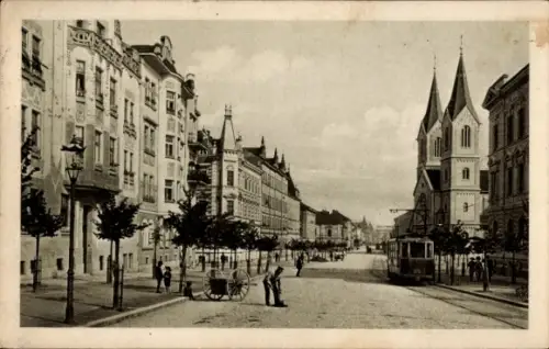 Ak Pécs Fünfkirchen Ungarn, Straße mit Bäumen, Straßenbahn, Häusern, Menschen, Kutsche