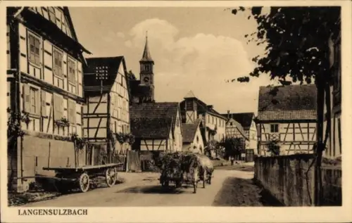 Ak Langensoultzbach Langensulzbach Elsass Bas Rhin, Viel Fachwerkhäuser, Dorfstraße, Kirche im...