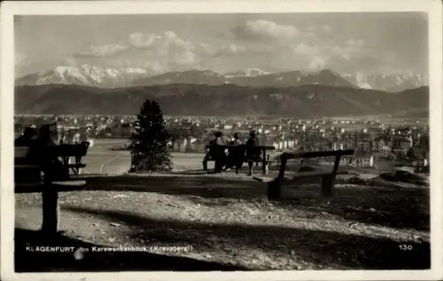 Ak Klagenfurt am Wörthersee Kärnten,  Karawankenblick, Berge, Stadtansicht, Bänke