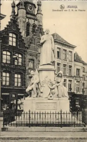 Ak Kortrijk Courtrai Westflandern, Statue von Z. H. de Haerne, Stadtansicht, Geschäfte im Hinterg