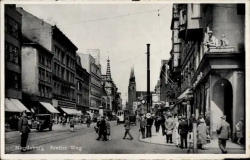 Ak Magdeburg an der Elbe, Magdeburg Breiter Weg, Straßenansicht, Menschen, Autos, Geschäfte