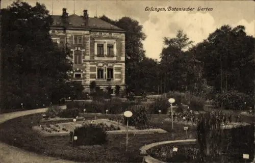 Ak Erlangen in Mittelfranken Bayern, Botanischer Garten,  Pflanzenbeete, Gebäude im Hintergrund
