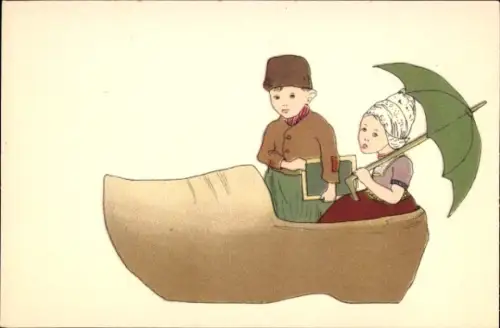 Ak Kinder in einem Holzschuh, Trachten Niederlande
