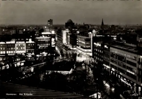 Ak Hannover,  Am Kröpcke, Nachtaufnahme, beleuchtete Gebäude, Straßenansicht