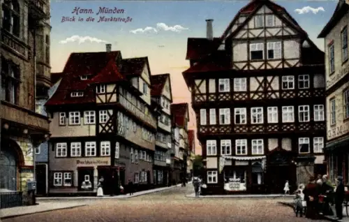 Ak Hann. Münden in Niedersachsen,  Blick in die Marktstraße, Fachwerkhäuser, Purthandlung