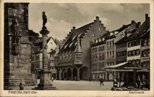 Ak Freiburg im Breisgau, Freiburg iBr, Kaufhaus,  Gebäude, Menschen auf dem Platz