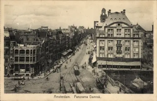 Ak Amsterdam Nordholland Niederlande,  Panorama Damrak, Straßenansicht, Straßenbahn,  Gebäude