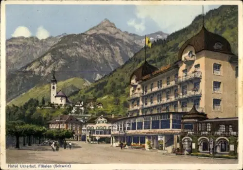 Ak Flüelen Kanton Uri Schweiz, Hotel Urnerhof,  Schweiz, Berge im Hintergrund, 