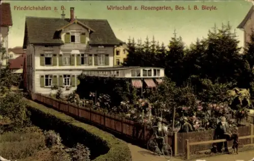 Ak Friedrichshafen am Bodensee, Friedrichshafen, Wirtschaft Rosengarten, Blumen, Garten, Fahrrad