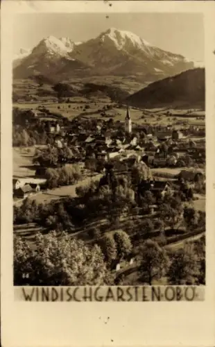 Ak Windischgarsten Oberösterreich, Landschaft mit Bergen, Dorfansicht, Kirche, Text: WINDISCHGARS