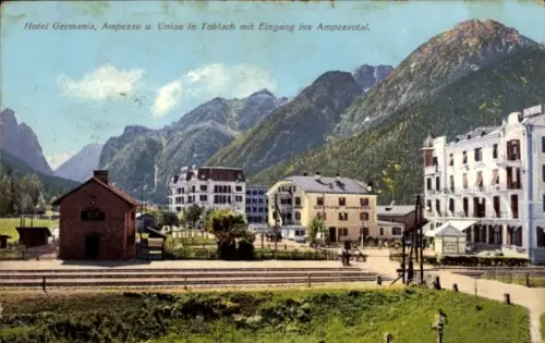 Ak Toblach Dobbiaco Südtirol, Hotel Germania, Berge, Eingang ins Ampezzotal, 
