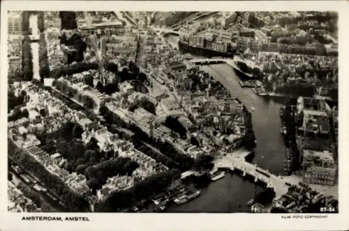 Ak Amsterdam Nordholland Niederlande, Luftaufnahme von  Amstel, KLM Foto Copyright, 27-34