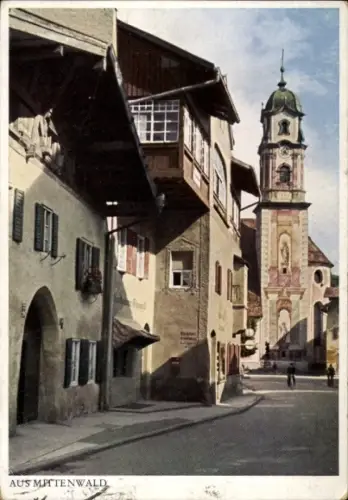 Ak Mittenwald in Oberbayern, Farbige ,  Uhrturm, alte Gebäude, Straße