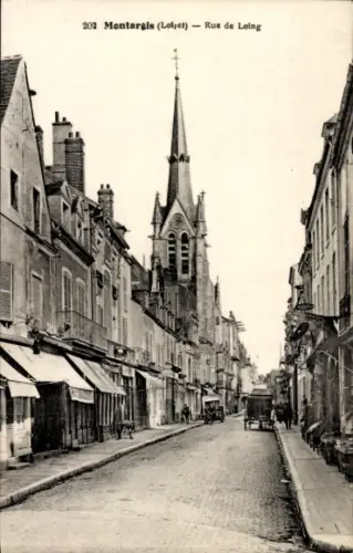 Ak Montargis Loiret, Straße mit Häusern, Kirche im Hintergrund, Pferdewagen, Schwarz-Weiß-Foto