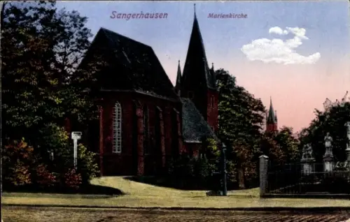 Ak Sangerhausen am Harz,  Marienkirche, Gebäude mit Türmen, Bäume im Vordergrund