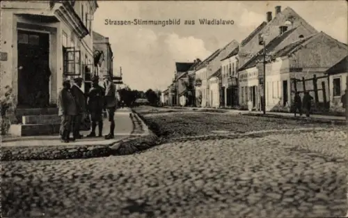 Ak Wladislawo Polen, Straße, Häuser, Passanten