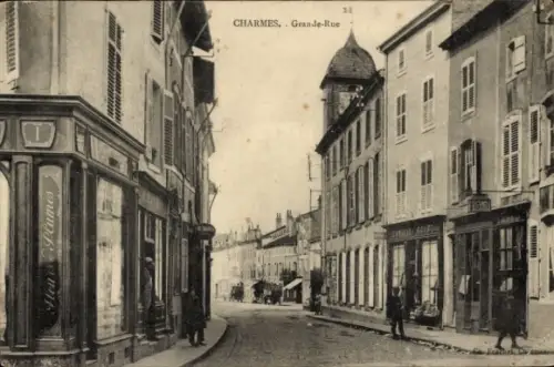 Ak Charmes Vosges, Schmale Straße, Geschäfte,  Atmosphäre, alte Architektur