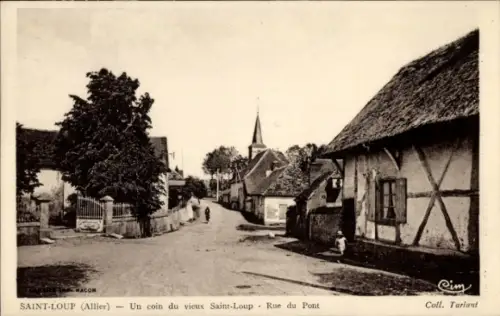 Ak Saint Loup Allier, Un coin du vieux Saint Loup, Rue du Pont