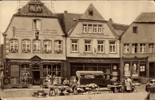 Ak Sankt Wendel Saarland, Häuser mit Bekenntnissprüchen am Domplatz, Marktstände