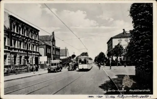 Ak Berlin Neukölln Rudow,  Neuköllner Straße, Straßenbahn, Autos, Geschäftshaus