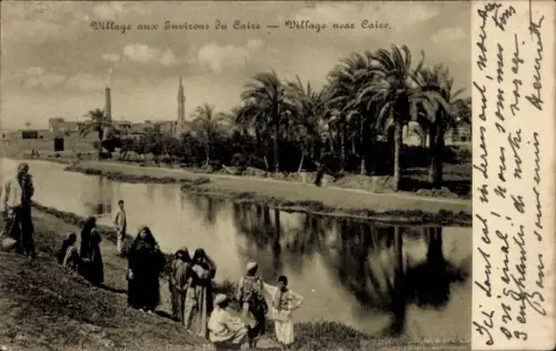 Ak Cairo Kairo Ägypten, Wasserkanal, Palmen, Männer, Frauen, Kinder in traditioneller Kleidung am