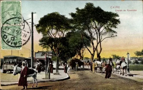 Ak Cairo Kairo Ägypten, Baumgesäumte Straße, Fußgänger in traditionellen Gewändern, Esel, Pferdek