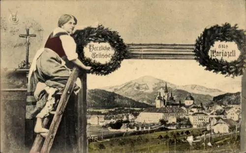 Ak Mariazell Steiermark, Frau auf Leiter, Kranz mit Schrift 'Herzliche Grüsse'