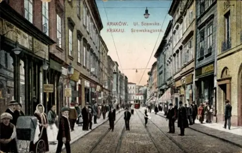 Ak Kraków Krakau Polen, Straße mit Geschäften, Menschen, Straßenbahn,  Szenerie