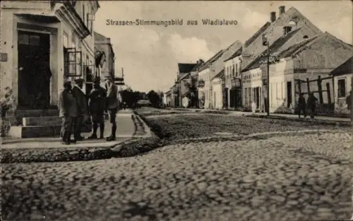 Ak Wladislawo Polen, Straße, Häuser, Passanten