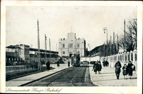 Ak Lodz Lodsch Polen, Partie am Hauptbahnhof, Straßenbahn, Passanten
