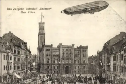 Ak Zittau in Sachsen, Zeppelin Luftschiff Sachsen über der Stadt