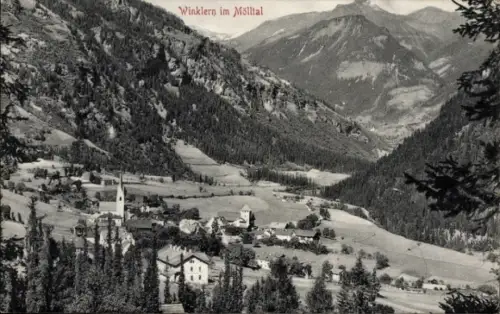 Ak Winklern im Mölltal Kärnten, Tal mit kleinem Dorf, Kirche mit hohem Turm, Häuser, Wiesen, Wäld