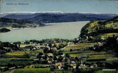 Ak Reifnitz Maria Wörth am Wörthersee Kärnten, Weitblick über See, Ufer, Dorf mit Häusern und Fel