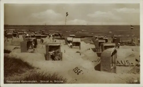 Ak Ostseebad Kellenhusen in Holstein,  Strand m. Brücke, Strandkörbe, FISE, AUS., Verlag Kessner 