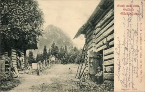 Ak Johnsbach im Gesäuse Steiermark, Hesshütte, Holzhütten, Leiter an Hütte, Bäume und Berg im Hin