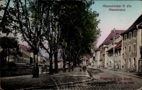 Ak Masevaux Masmünster Elsass Haut Rhin, Eingang in die Stadt, Straßenpartie