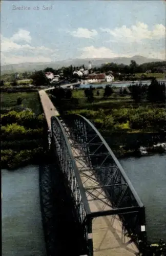 Ak Brežice Slowenien,  Brücke über die Sava, Ortschaft mit Kirchturm