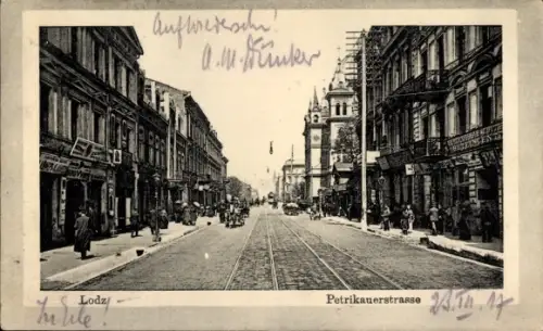 Ak Łódź Lodz Lodsch Polen,  Petrikauerstraße, Straßenansicht, Fahrzeuge, Menschen