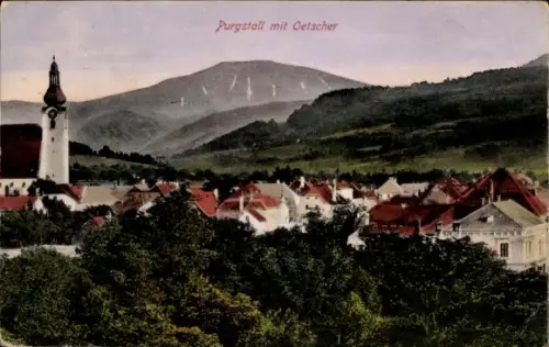 Ak Purgstall an der Erlauf in Niederösterreich, Kirchturm mit Uhr, Hausdächer, dichter Baumbestan