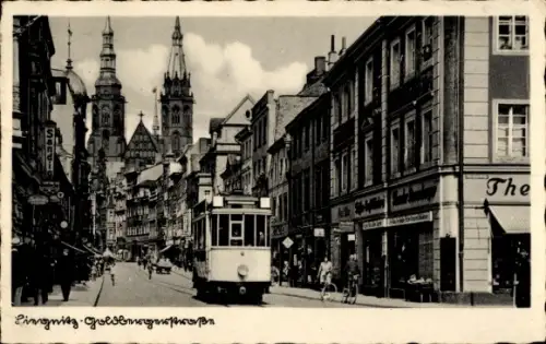 Ak Legnica Liegnitz Schlesien, Goldbergerstraße, Straßenbahn, Kirche, Geschäft Theodor Rosenberger