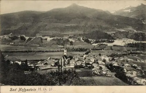 Ak Bad Hofgastein in Salzburg, Dorfpanorama, Kirche mit hohem Turm, Felder, Wälder, Gebirge, Eise