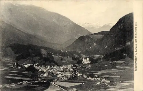 Ak Mauterndorf in Salzburg, Dorf im Tal, Gebäude mit Turm, Felder, Straßen, Berge im Hintergrund