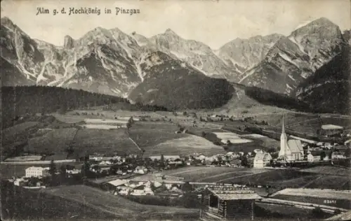 Ak Mühlbach am Hochkönig in Salzburg, Bergpanorama, Dorf mit Kirchturm, Wiesen und Felder, Wald, 