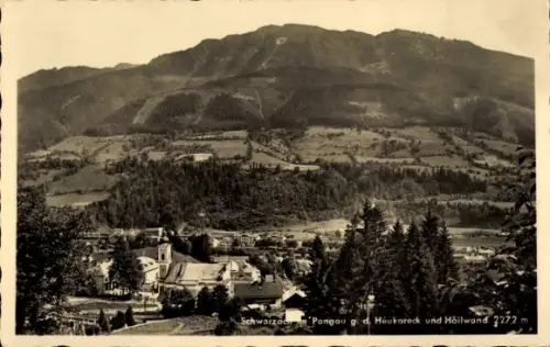 Ak Schwarzach im Pongau in Salzburg, Kirchturm und Dorf, Felder und Höfe, Waldrand, Bergkette mit