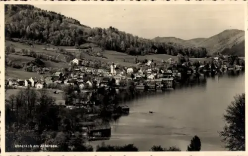Ak Unterach am Attersee Oberösterreich, Dorf am See, Häuser am Ufer, Kirche mit Turm, Bootshäuser