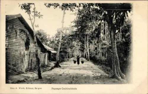Ak Cochinchine Vietnam, Landschaft, Lastenträger auf einer Straße