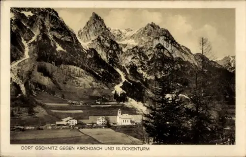 Ak Gschnitz in Tirol, Bergkulisse mit schroffen Gipfeln, Dorf mit Kirche und Glockenturm, Nadelba