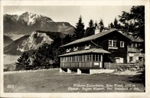 Ak Stollhof Hohe Wand Niederösterreich, Hütte mit verglaster Veranda, Nadelbäume, verschneite Gip