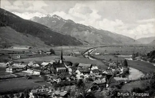 Ak Bruck im Pinzgau Bruck an der Großglocknerstraße in Salzburg, Dorf mit Kirchturm, Fluss entlan